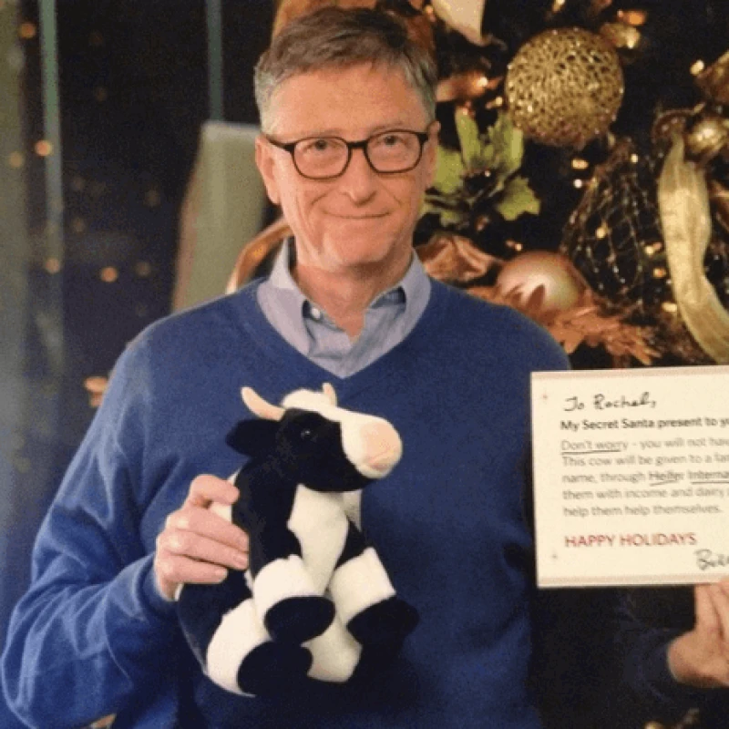 Bill Gates with stuffed cow e