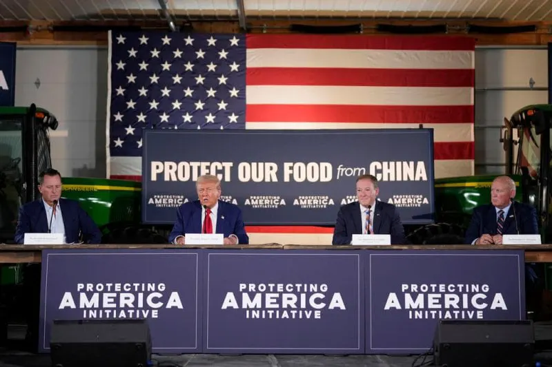 Donald Trump Republican presidential nominee former President Donald Trump speaks at a campaign event at a farm, Monday, Sept. 23, 2024, in Smithton, Pa, as from left, Richard Grenell, Lee Zeldin and Rep. Glenn Thompson, R-Pa., listen. (AP Photo/Alex Brandon)