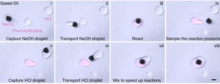 A magnetic microrobot pulls fluid droplets together, triggering a chemical reaction.
