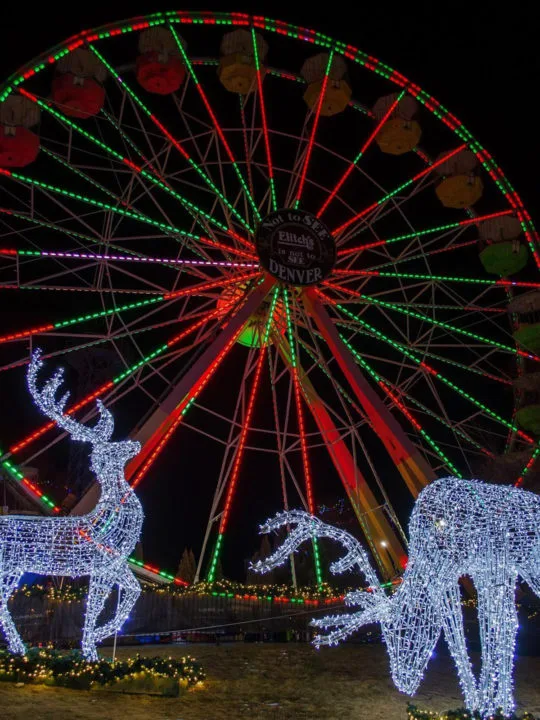 A Ferris wheel with red and green lights