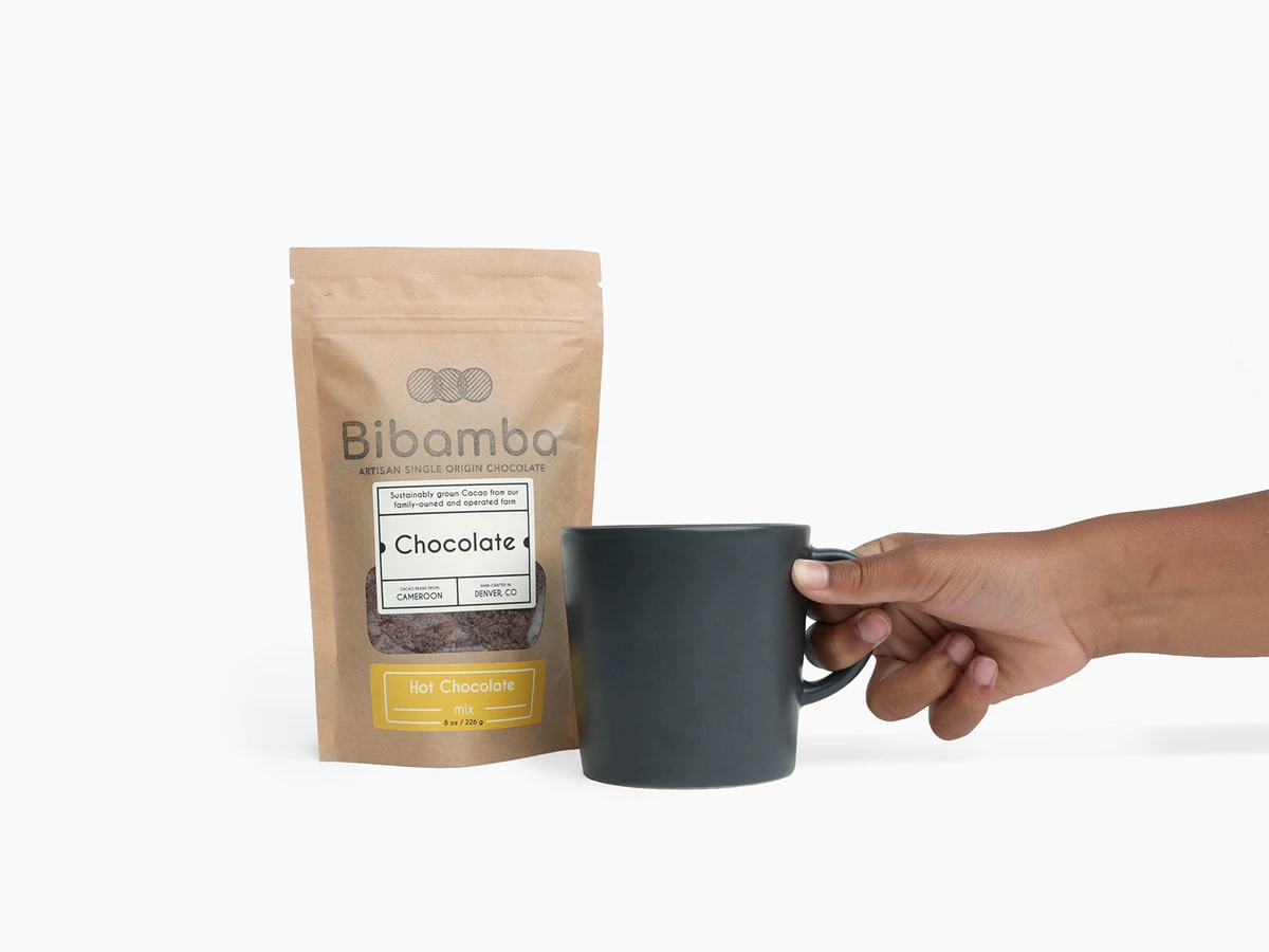 Bag of hot chocolate mix and a mug