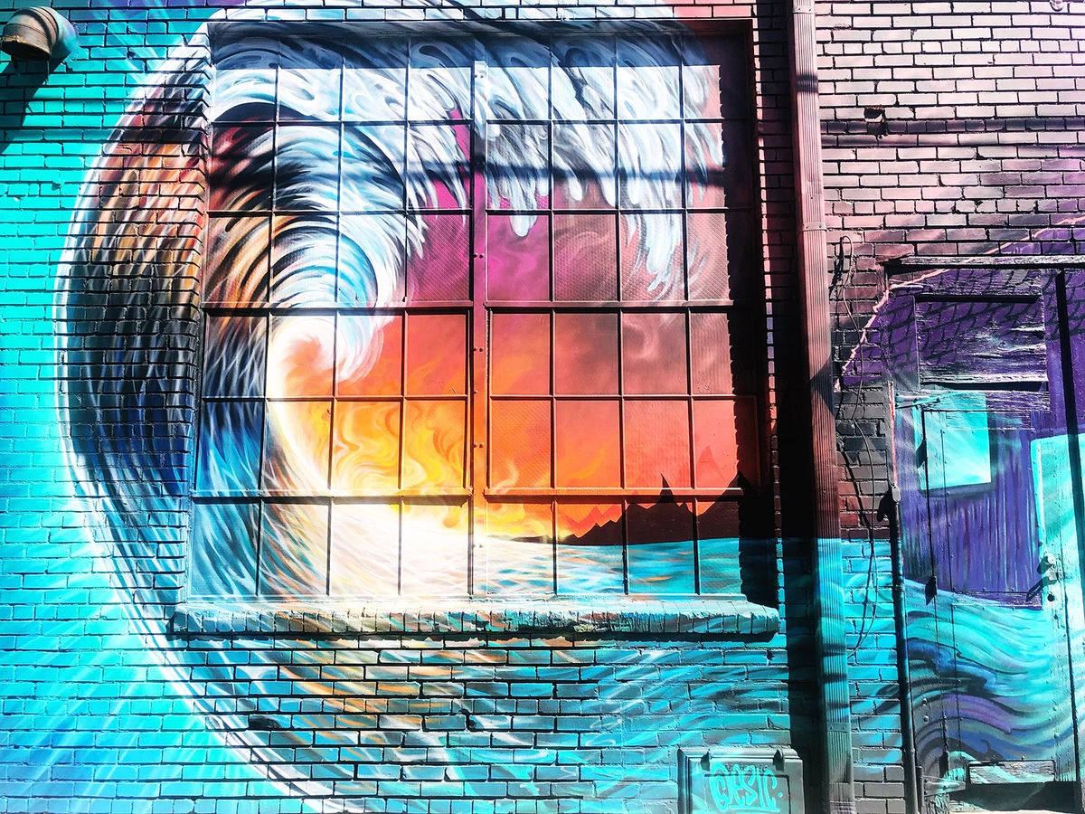 A mural of a wave, "Still Wave" by ESIC, in RiNo.