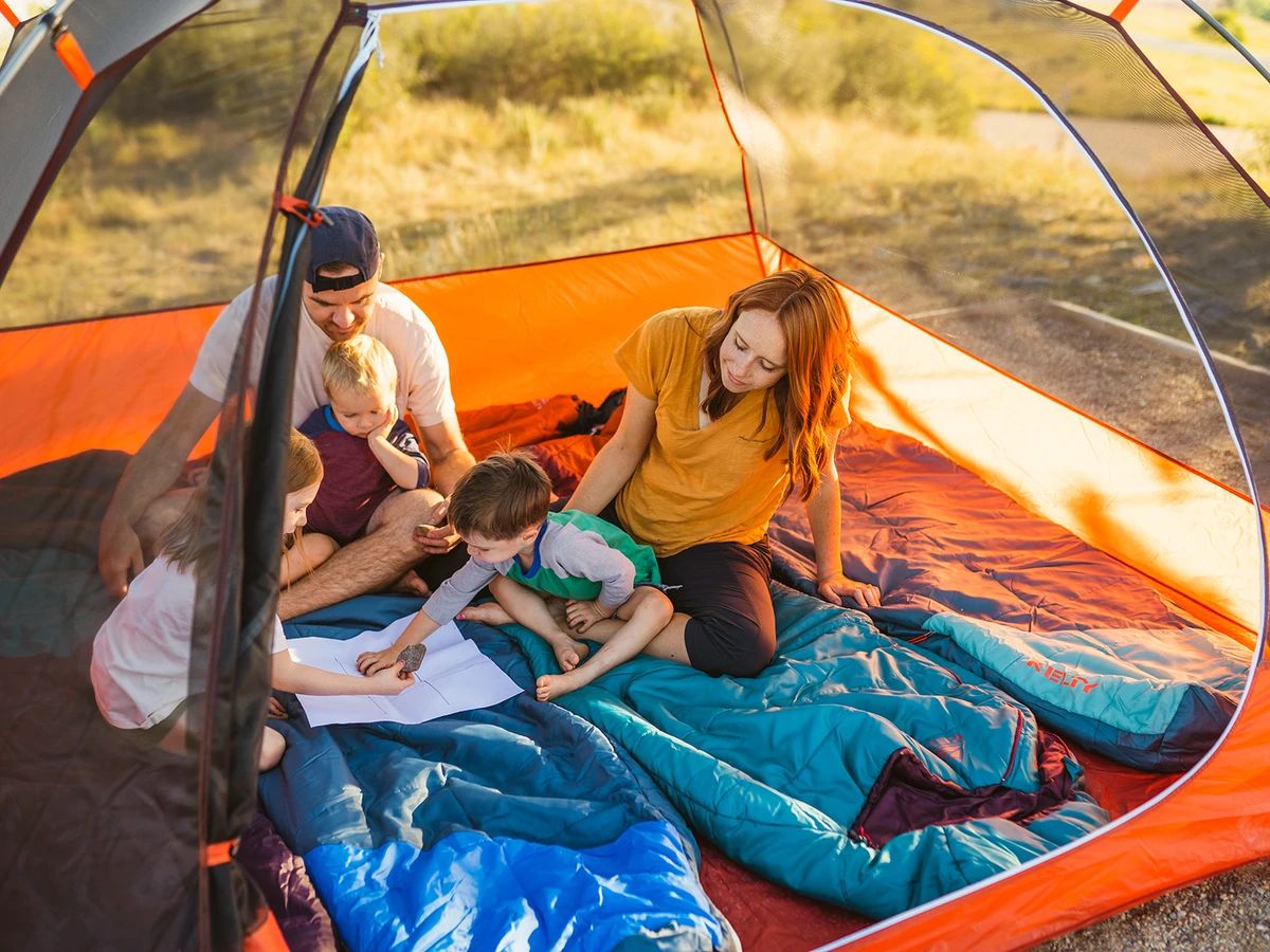 A small family inside the Kelty Rumpus 6
