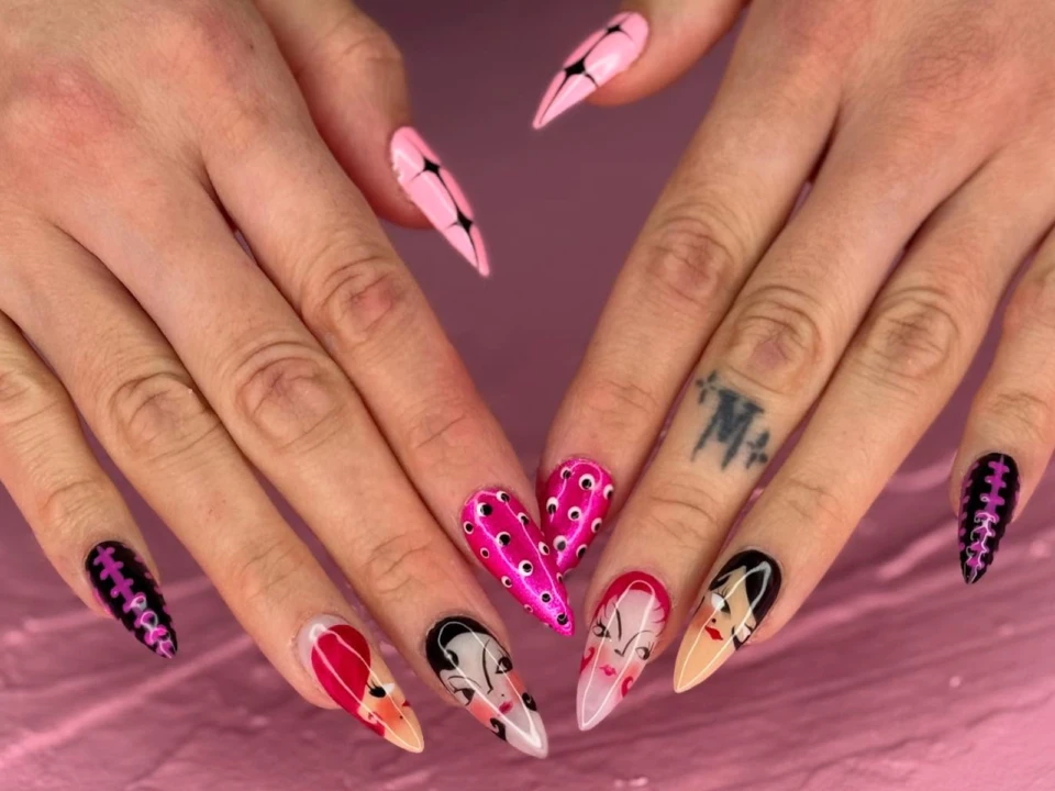 Detailed pink nails with character faces