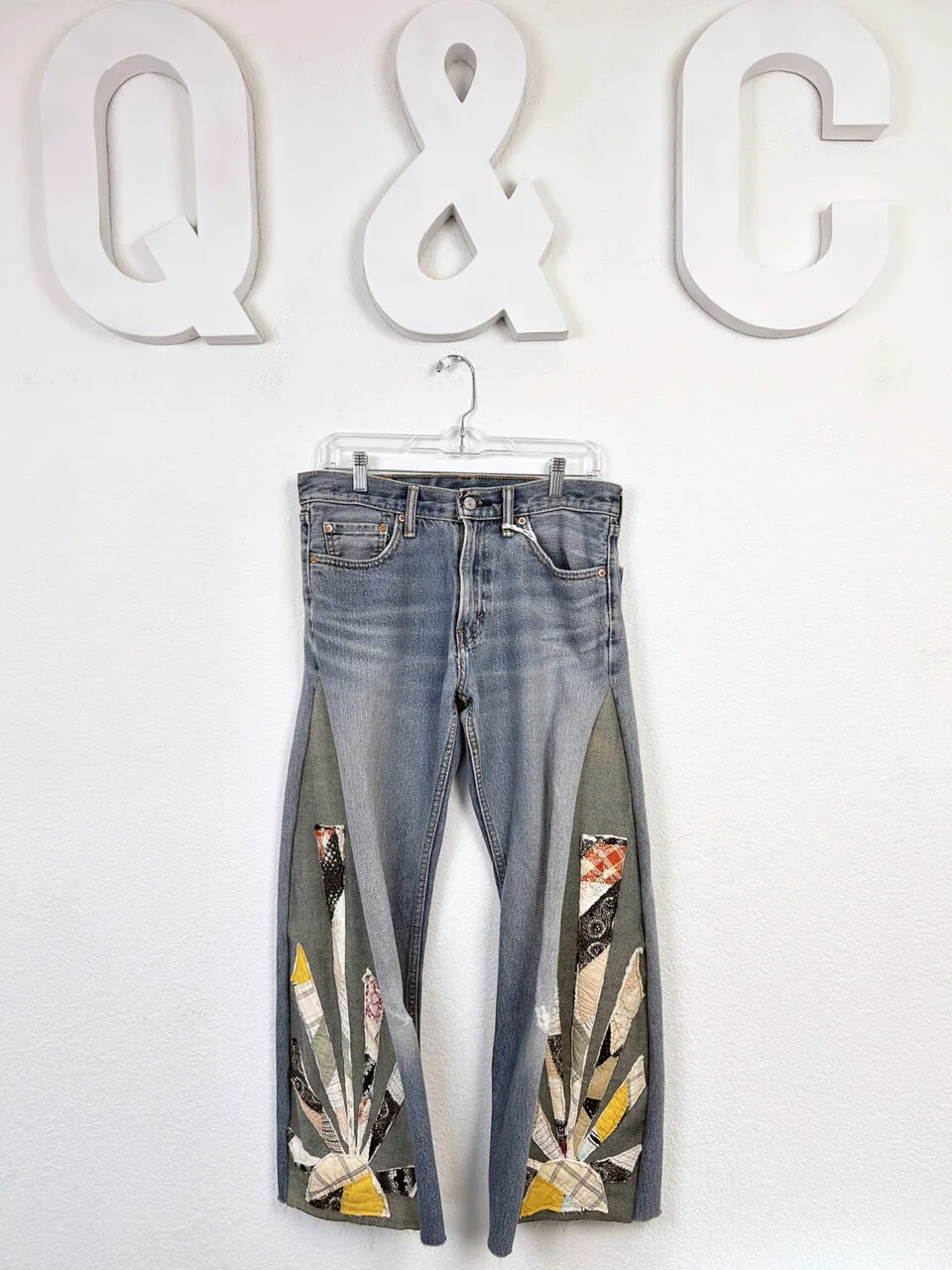 Vintage jeans with quilted patterning on the bottoms and sides