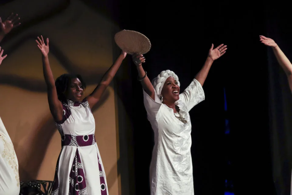 Two performers sing during Black Nativity.