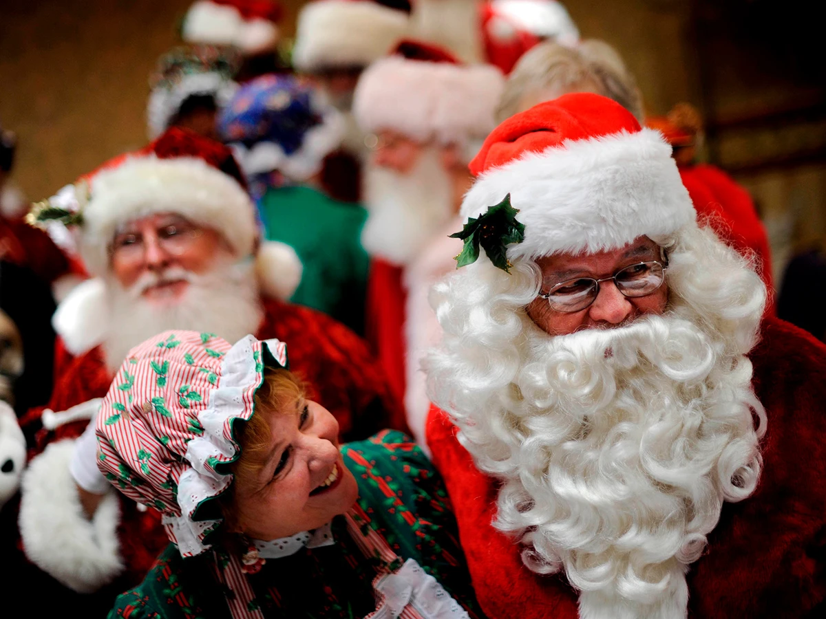 Mrs. Claus hugs Santa