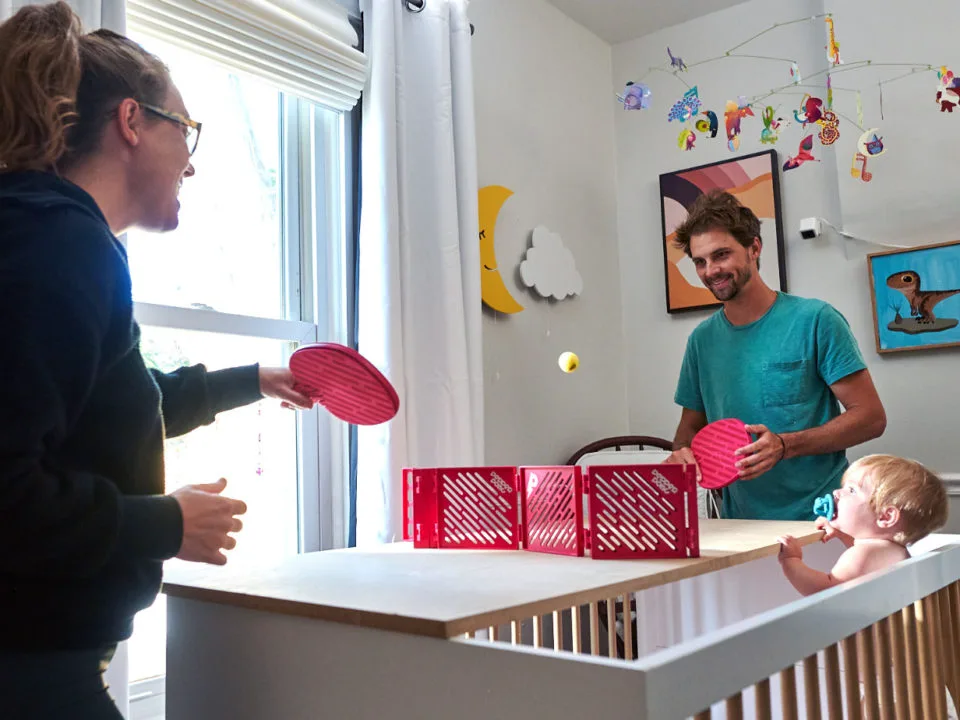 Pepper Pong set up on a piece of plywood on a baby’s crib