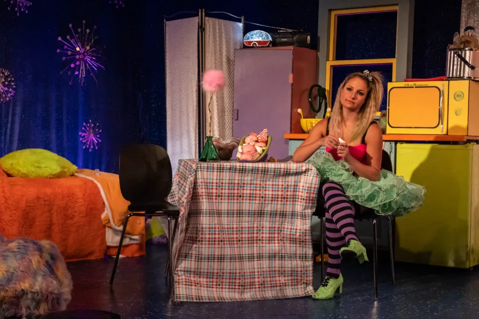 Cindy Lou Who sits at a kitchen table in Who's Holiday!