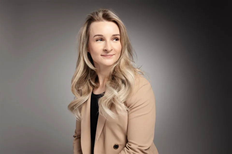 A headshot of Izabel Zambrzycki