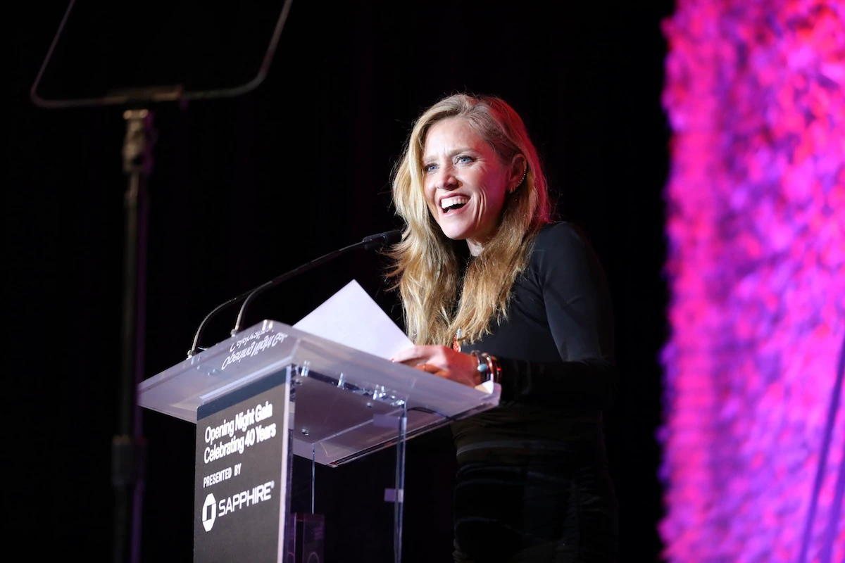 Amy Redford stands behind a podium at Sundance Film Festival in 2024