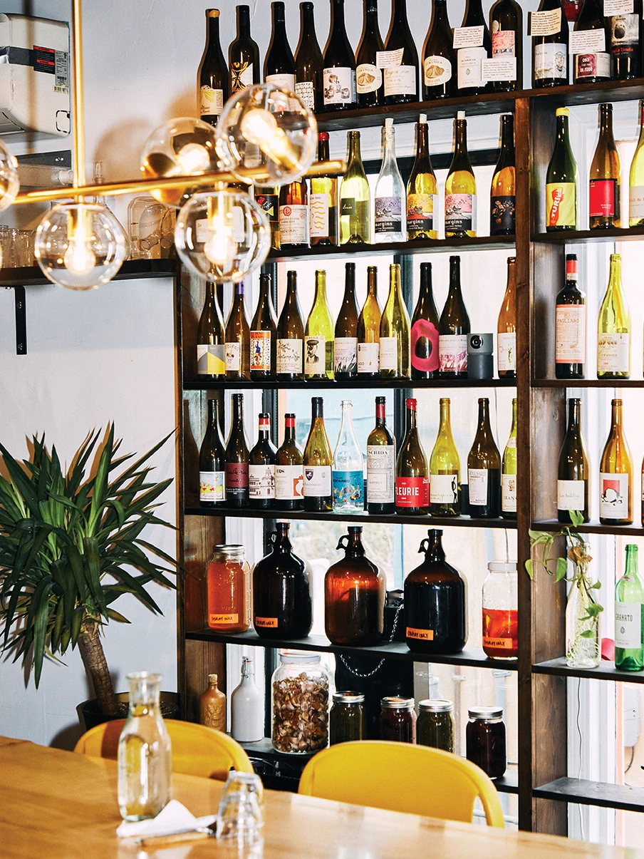 Restaurant with bottles on wall