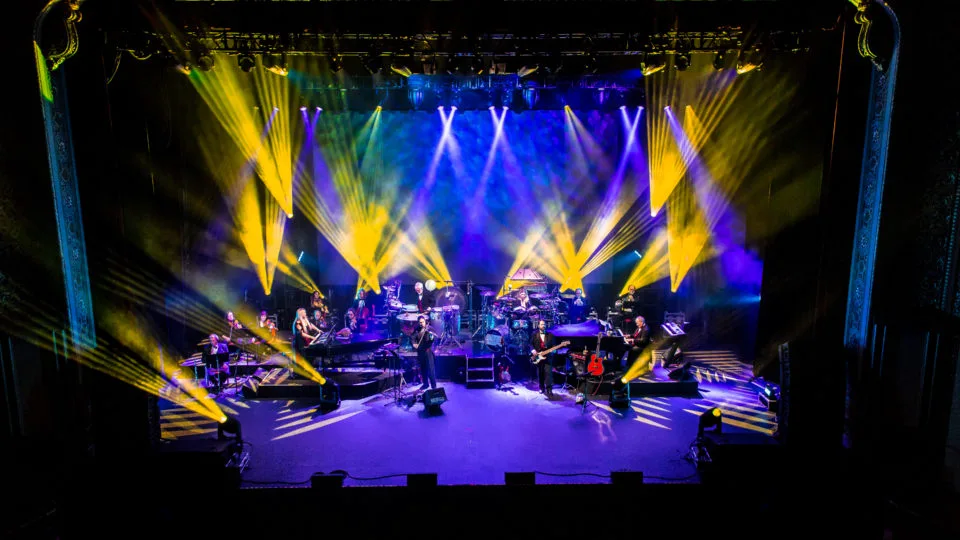 Mannheim Steamroller performs on stage.