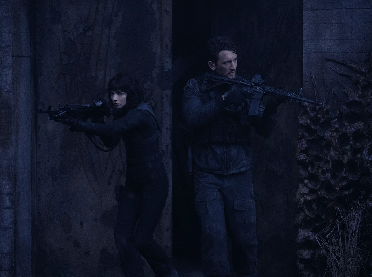 Two snipers dressed in all black