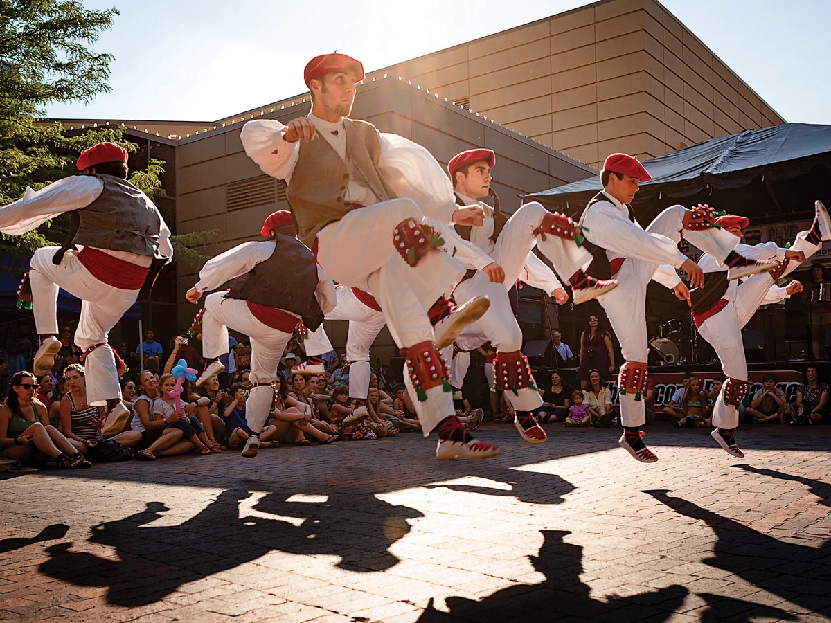 Men in traditional dress dancing