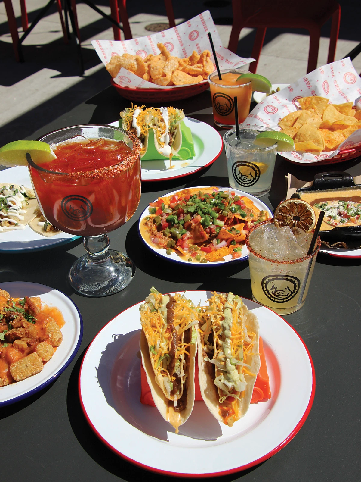 Happy hour spread at Cochino Taco