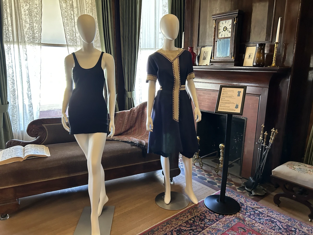 A dresslike swimsuit and a smaller bodysuit