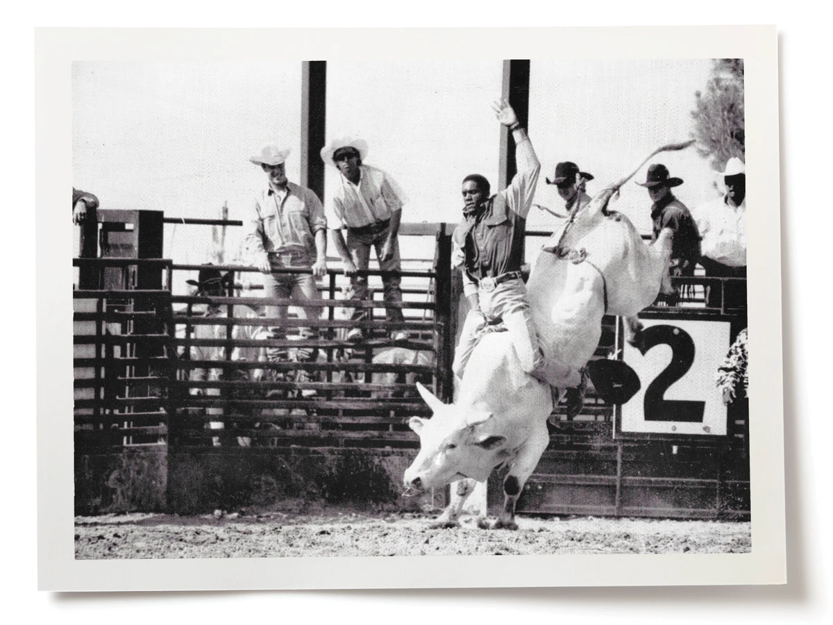 B&W historical image of man on bareback at Bill Pickett