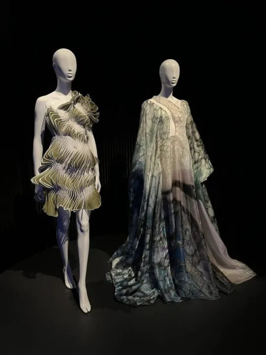 short and long sculptural dresses on mannequins