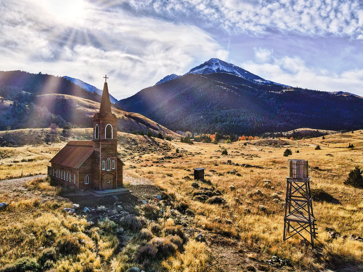 Western landscape with church & buildings