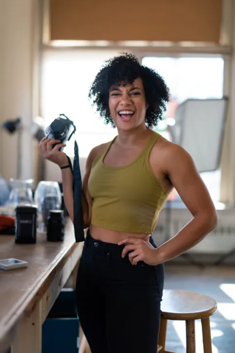 Natalia Roberts holding a camera