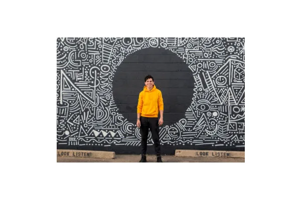 Denver Muralist Charlo Is On a Mission To Spread Joy